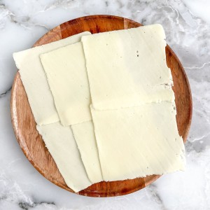 Plate of white american cheese.