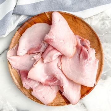 Plate of sliced ham.